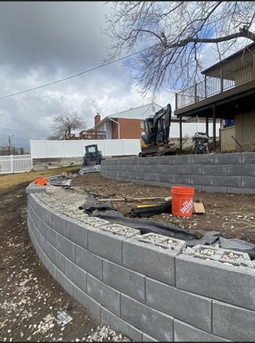 Boulder Walls project by EC Hardscape & Concrete